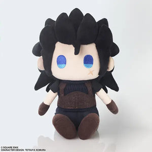 A chibi-style plush toy with black spiky hair, large blue eyes, a cream face, and a dark brown outfit, photographed against a clean white background.