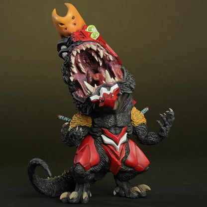 Monster figurine with red and black design on a dark background