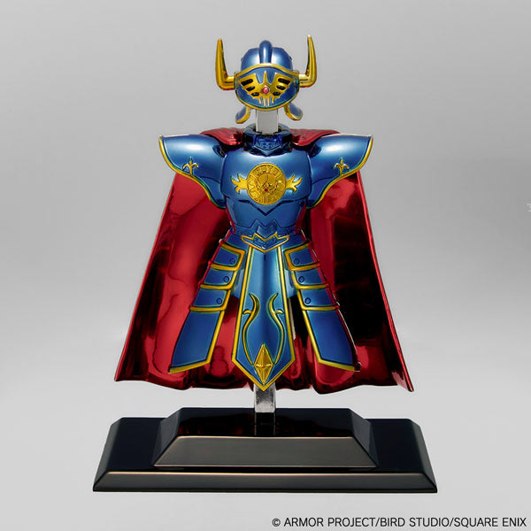 Figurine of a character in blue armor with red cape on a gray background