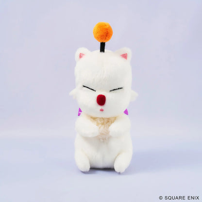 A white plush cat character toy with closed eyes, a red nose, pink inner ears, a small orange pom-pom on a black stick, and purple triangular accents, centered on a pale lavender studio background. A small Square Enix copyright mark appears in the bottom right corner.