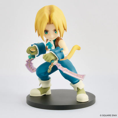 Animated character figurine with blue outfit and yellow hair on a white background