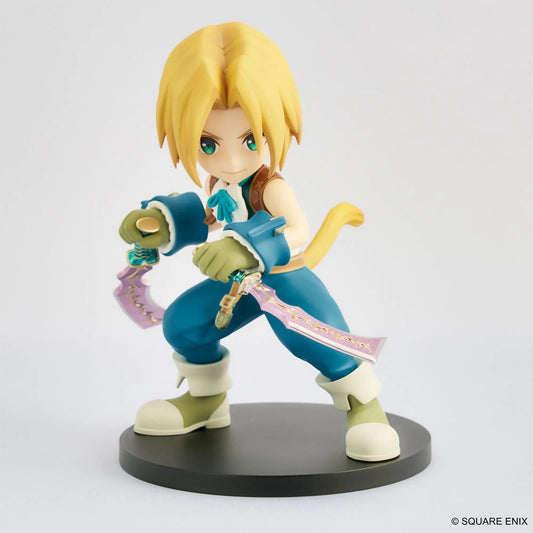 Animated character figurine with blue outfit and yellow hair on a white background