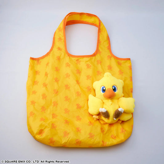Yellow reusable bag with a duck plushie on a light gray background