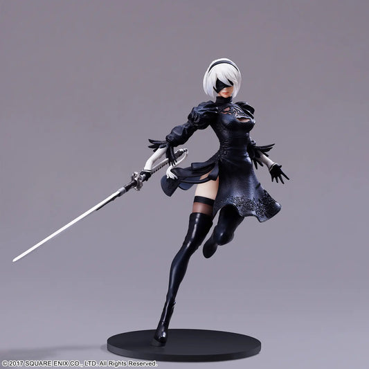 Action figure in black outfit with a sword on a gray background