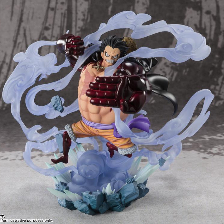 A detailed collectible figurine of a One Piece character in an action pose, surrounded by translucent icy blue energy effects and mounted on a sculpted base, photographed against a textured gray backdrop.