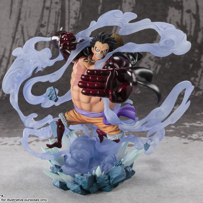 A detailed collectible figurine of a One Piece character in an action pose, surrounded by translucent icy blue energy effects and mounted on a sculpted base, photographed against a textured gray backdrop.
