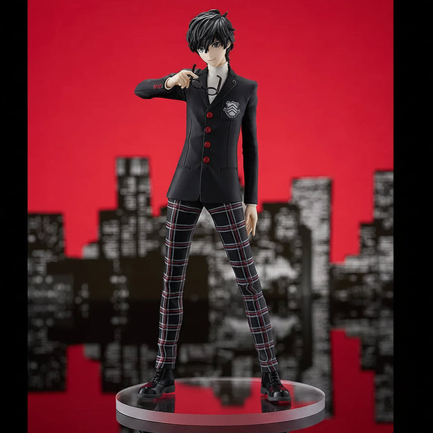 A collectible anime figurine of a male character in a dark school uniform with red buttons and plaid trousers, standing on a circular display base against a red background with a black-and-white cityscape silhouette.