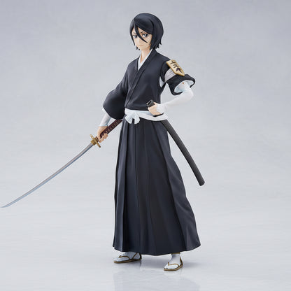 Anime character figure in black traditional outfit with a sword on a white background