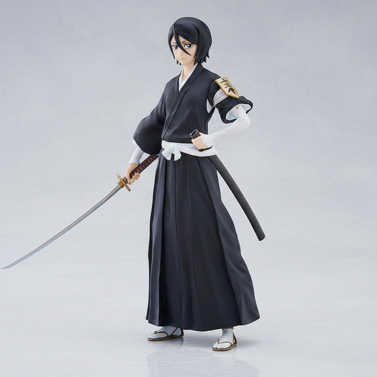 Anime character figure in black traditional outfit with a sword on a white background