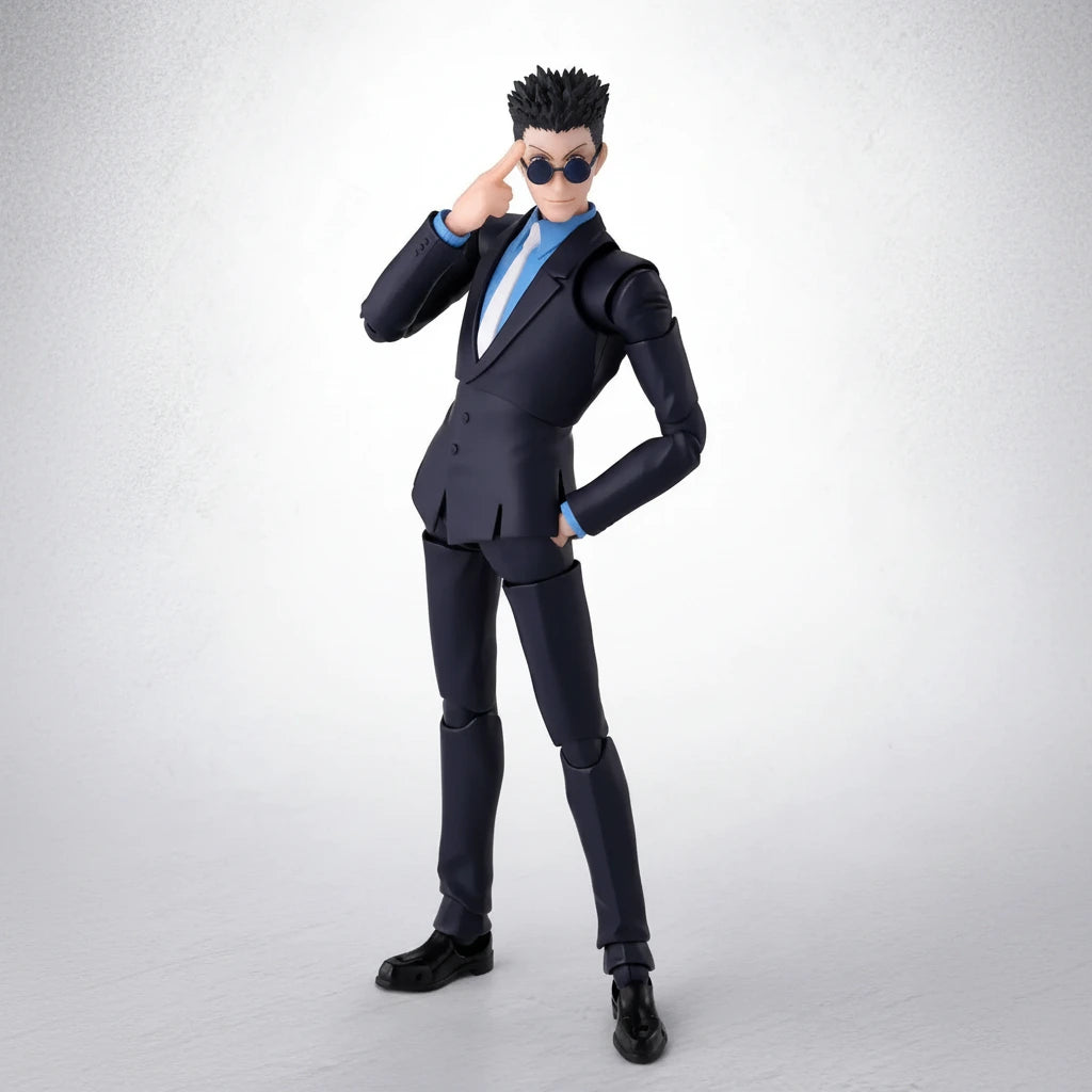 Action figure in a black suit with sunglasses on a white background