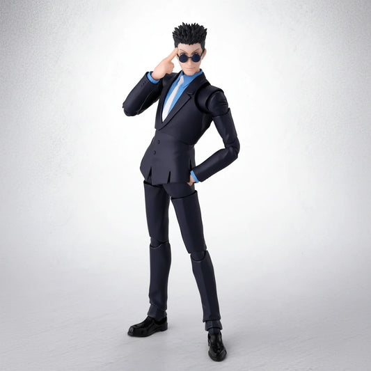 Action figure in a black suit with sunglasses on a white background