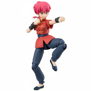 Anime character figurine with red hair and red outfit on a white background