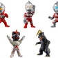 Collection of various toy figures on a white background