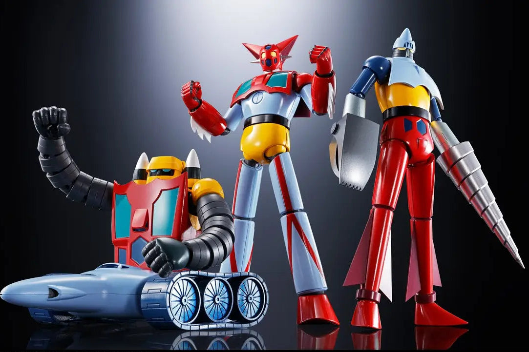 Three robot toy figures on a reflective surface with a dark background