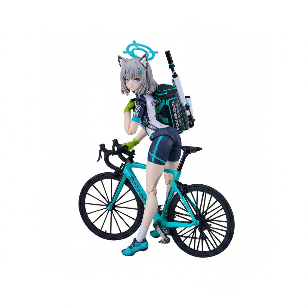 Figurine of a character with cat ears riding a bicycle on a white background
