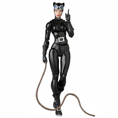 Catwoman action figure holding a rope on a white background